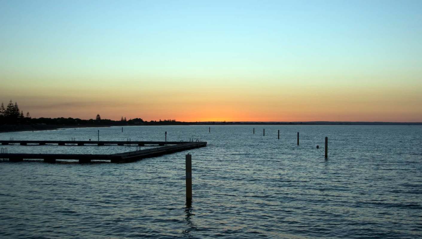 A teen swam miles to get help after his mother and two siblings were swept out to sea on a paddleboard.