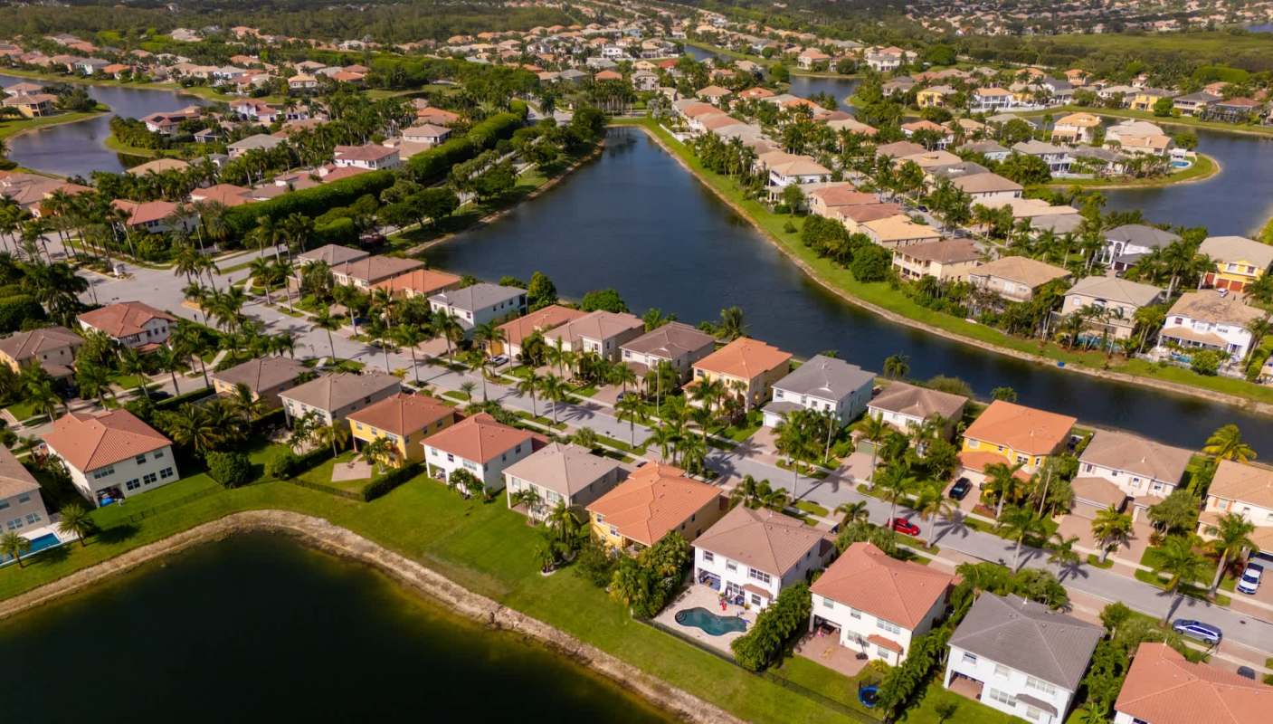 A Palm Beach landowner was slapped with over $600 in fines and administrative fees after hired landscapers "butchered" two protected trees.