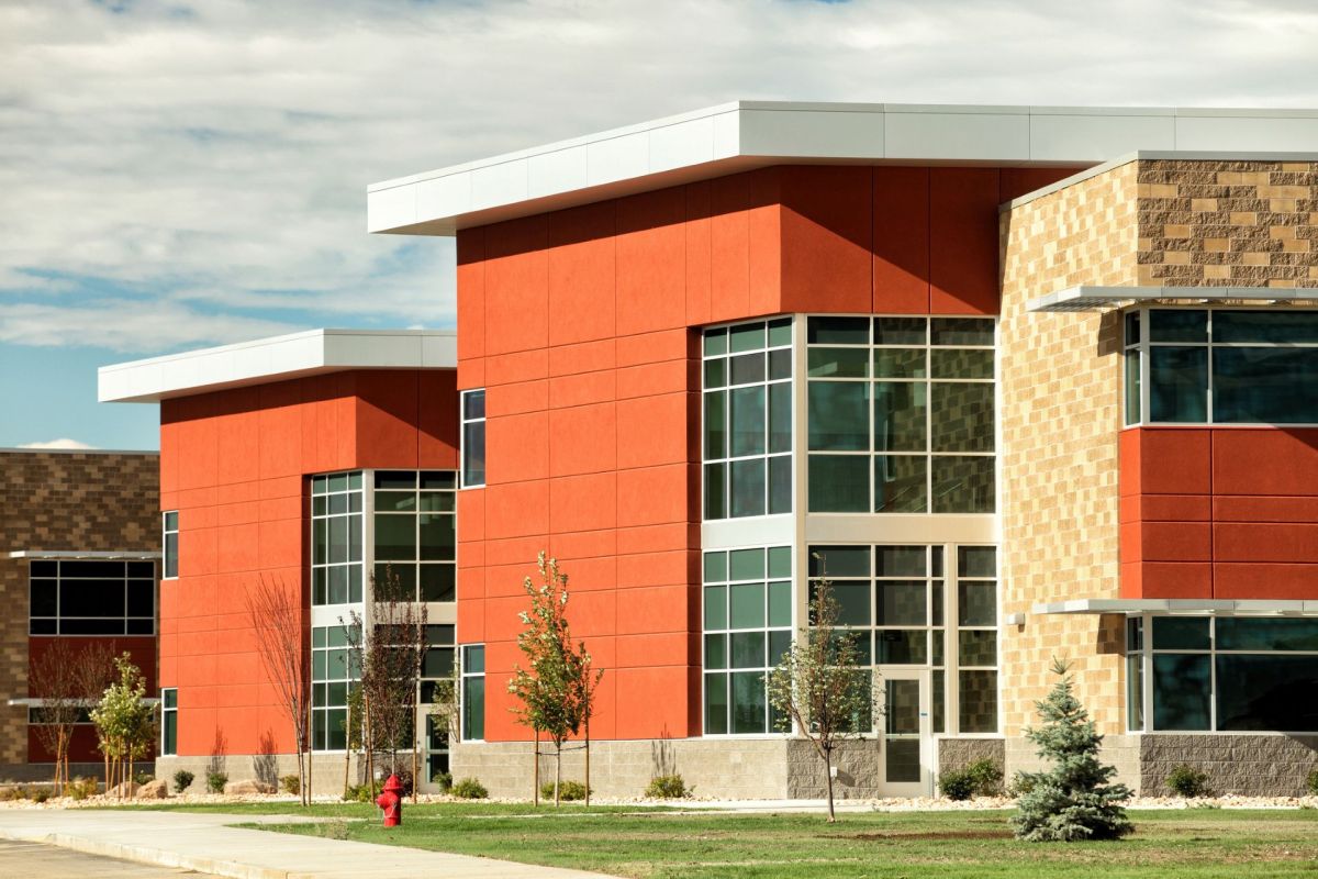 A disgruntled man was caught deliberately dumping human waste and other hazardous materials on the grounds of a U.K. school apparently as retaliation for a pay dispute.