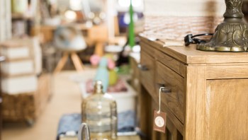 One lucky thrifter scored an antique side table for only $8 and shared their find on Reddit.