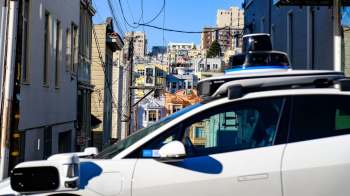 Waymo relies on overseas workers in the Philippines to guide its supposedly self-driving vehicles through tricky situations, raising major questions about safety and transparency.