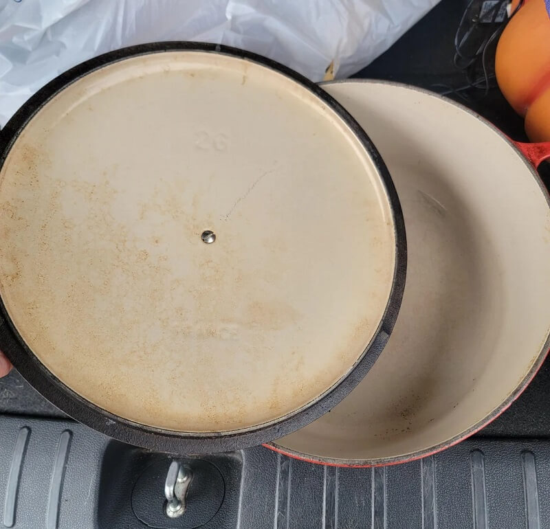 A Reddit user shared a photo of a red, well-loved Le Creuset pot that they'd purchased for less than the price of a latte.