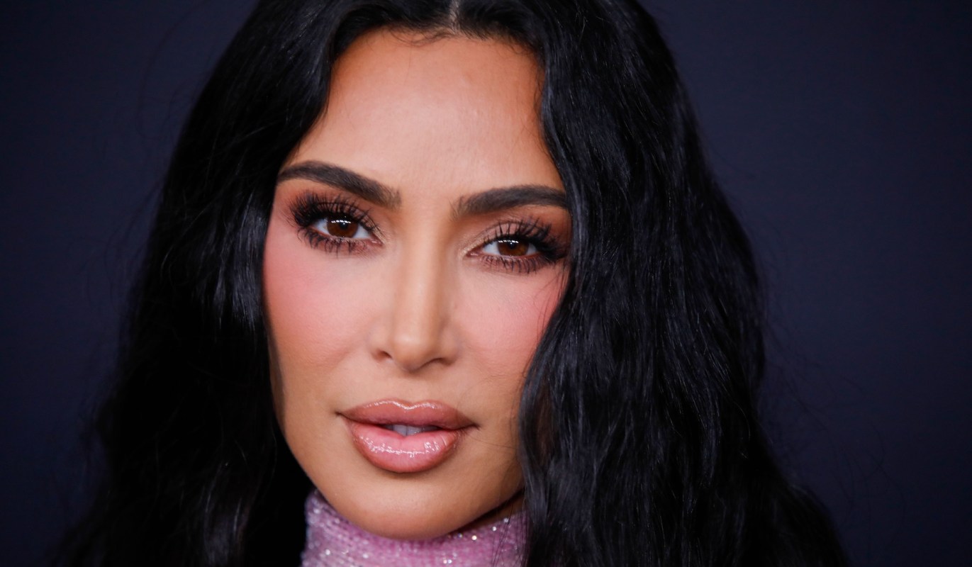 Kim Kardashian with a neutral expression.