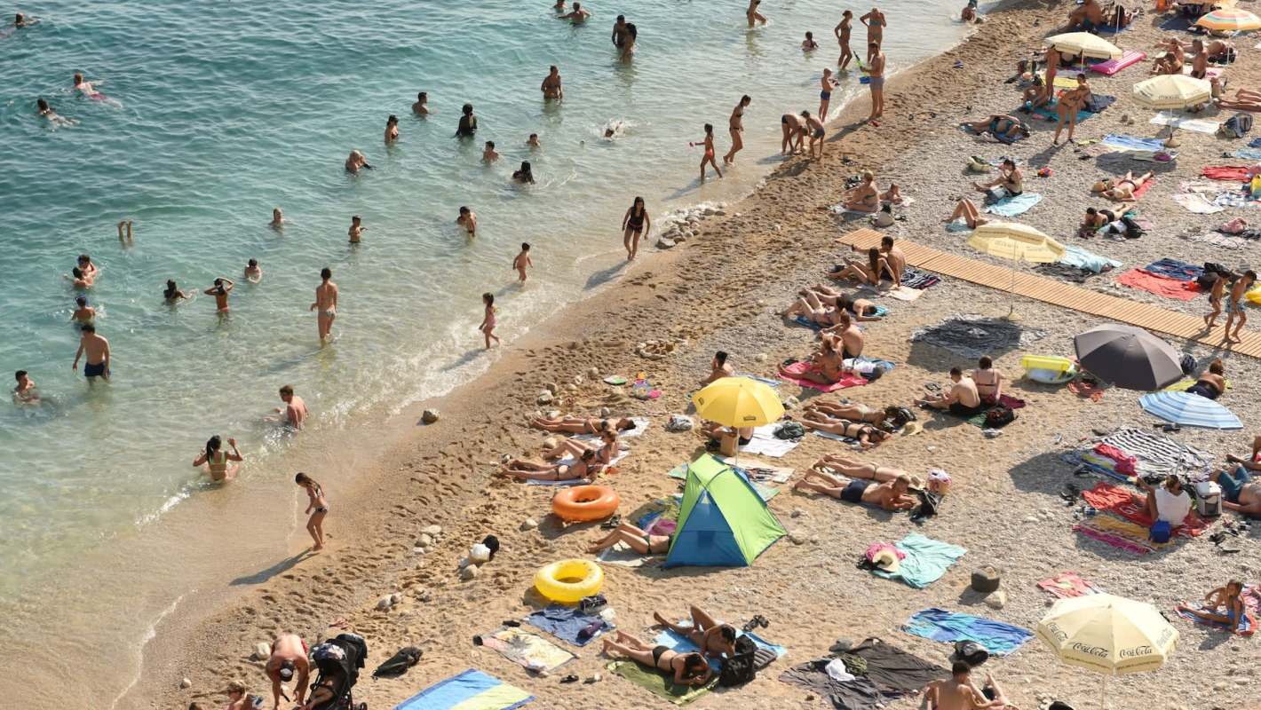 A frustrated user posted a video showing their annoyance at a boat towing a digital advertisement that distracts from what should be a relaxing day at the beach.