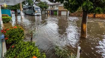 In a macabre symbol of the deadly floods that have struck Brazil, bystanders saw dozens of coffins being carried away by the fast-moving waters.