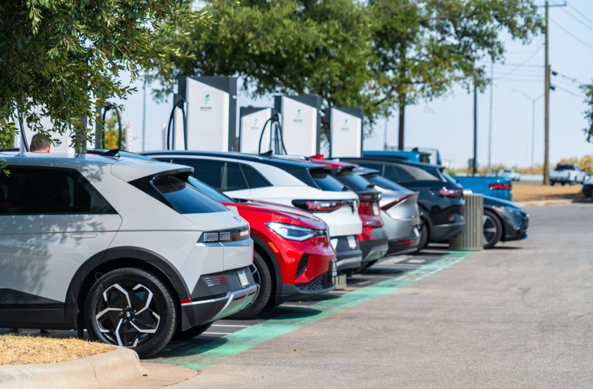 Electric vehicles in parking lot.