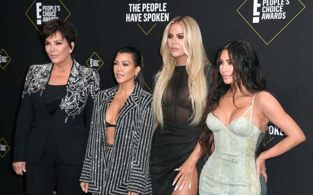Kardashian family at press event.