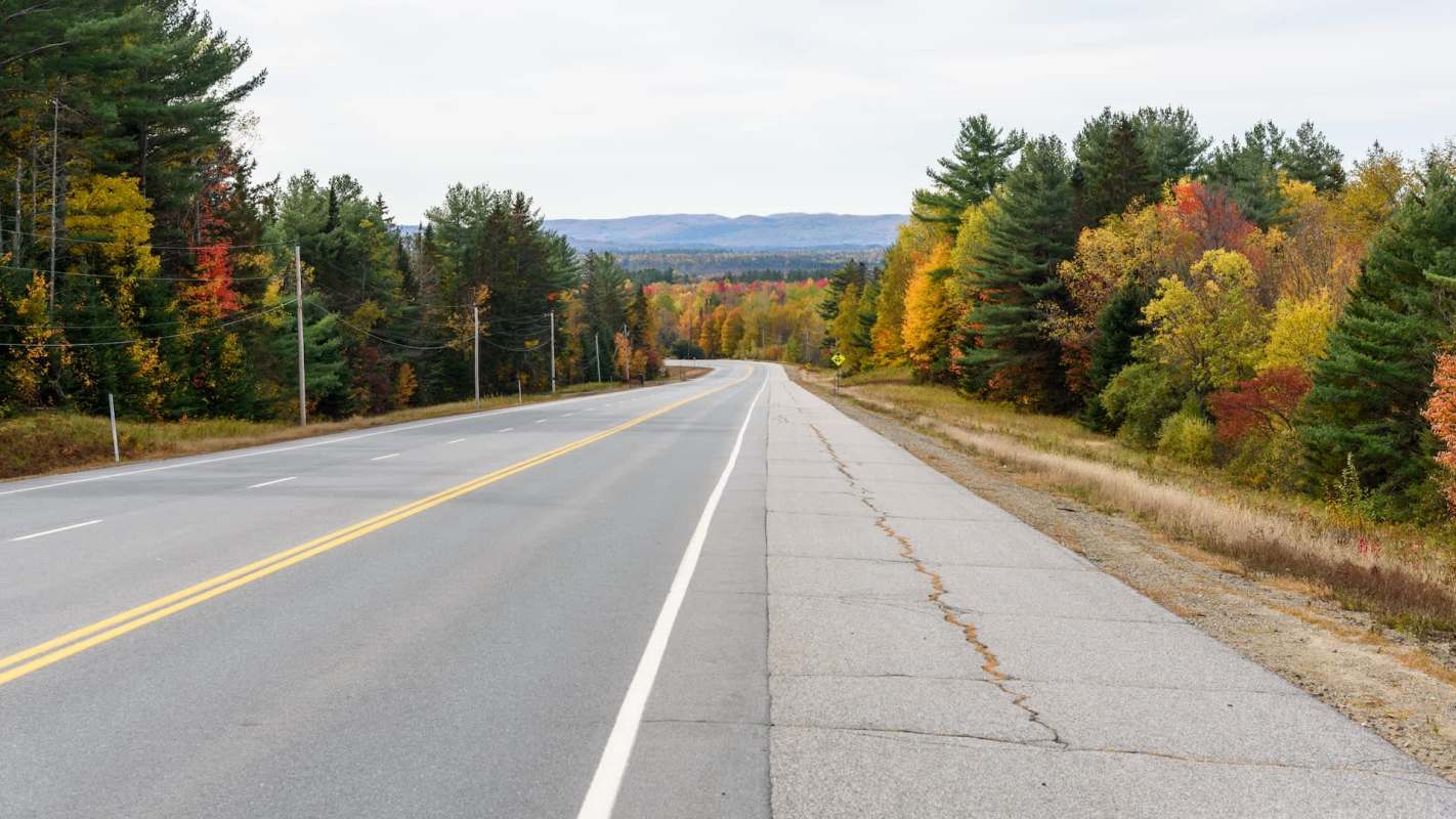 A plumber has been fined thousands of pounds after illegally dumping construction waste on a residential lane.