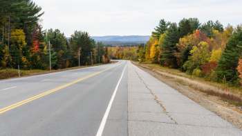 A plumber has been fined thousands of pounds after illegally dumping construction waste on a residential lane.