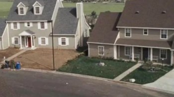 These McMansions, built very close together with extremely steep and high roofs, were the source of concern.