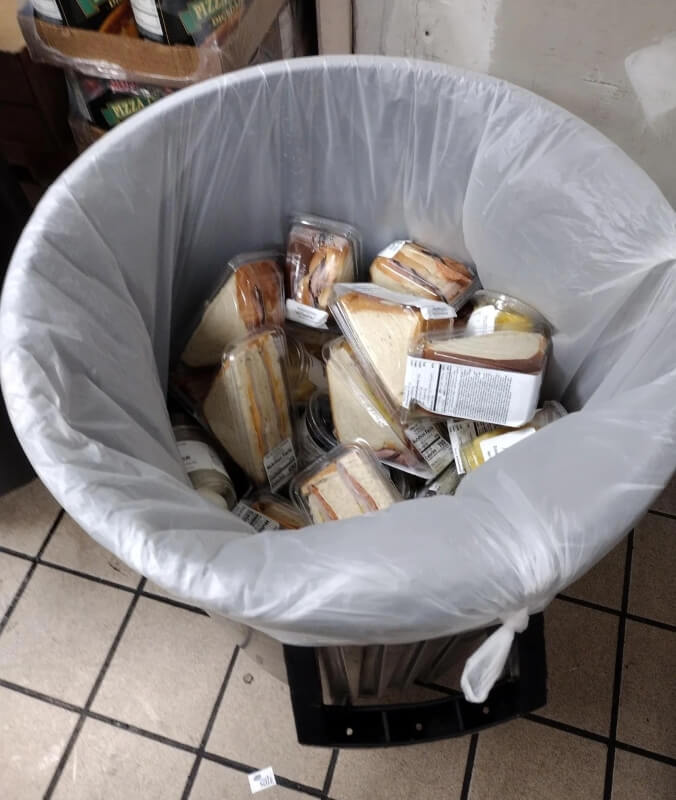 An employee shared in a viral Reddit post that their employer made them throw away food while they don't even earn a living wage.