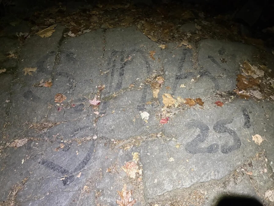 A hiker shared their frustrating experience of stumbling upon a vandalized stone structure along Winslow's Trail in New Hampshire.