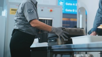 A security scan raised suspicion during a layover in Bangkok, and six pieces of rhino horns weighing over 25 pounds were seized from his luggage.