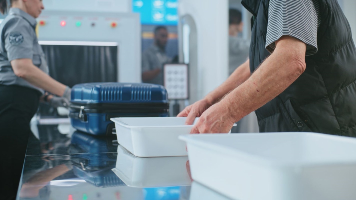 Airport security caught a man attempting to smuggle 15 live animals onto a plane by hiding them in his luggage.