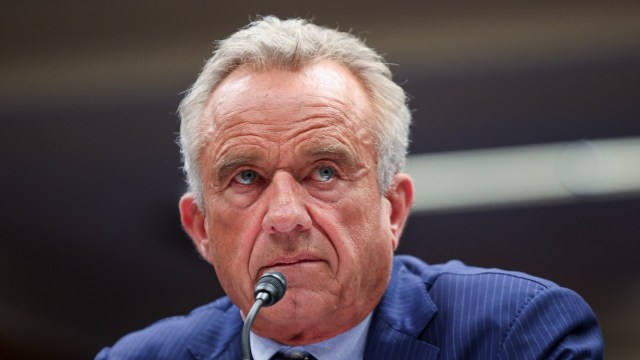 U.S. Secretary of Health and Human Services Robert F. Kennedy Jr. speaking into a microphone during a hearing.