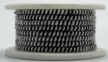 A spool of black and white braided yarn is displayed against a plain background.