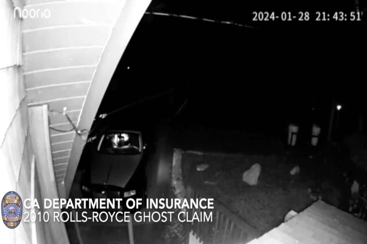 A surveillance image shows a 2010 Rolls-Royce Ghost parked outside in dim lighting.