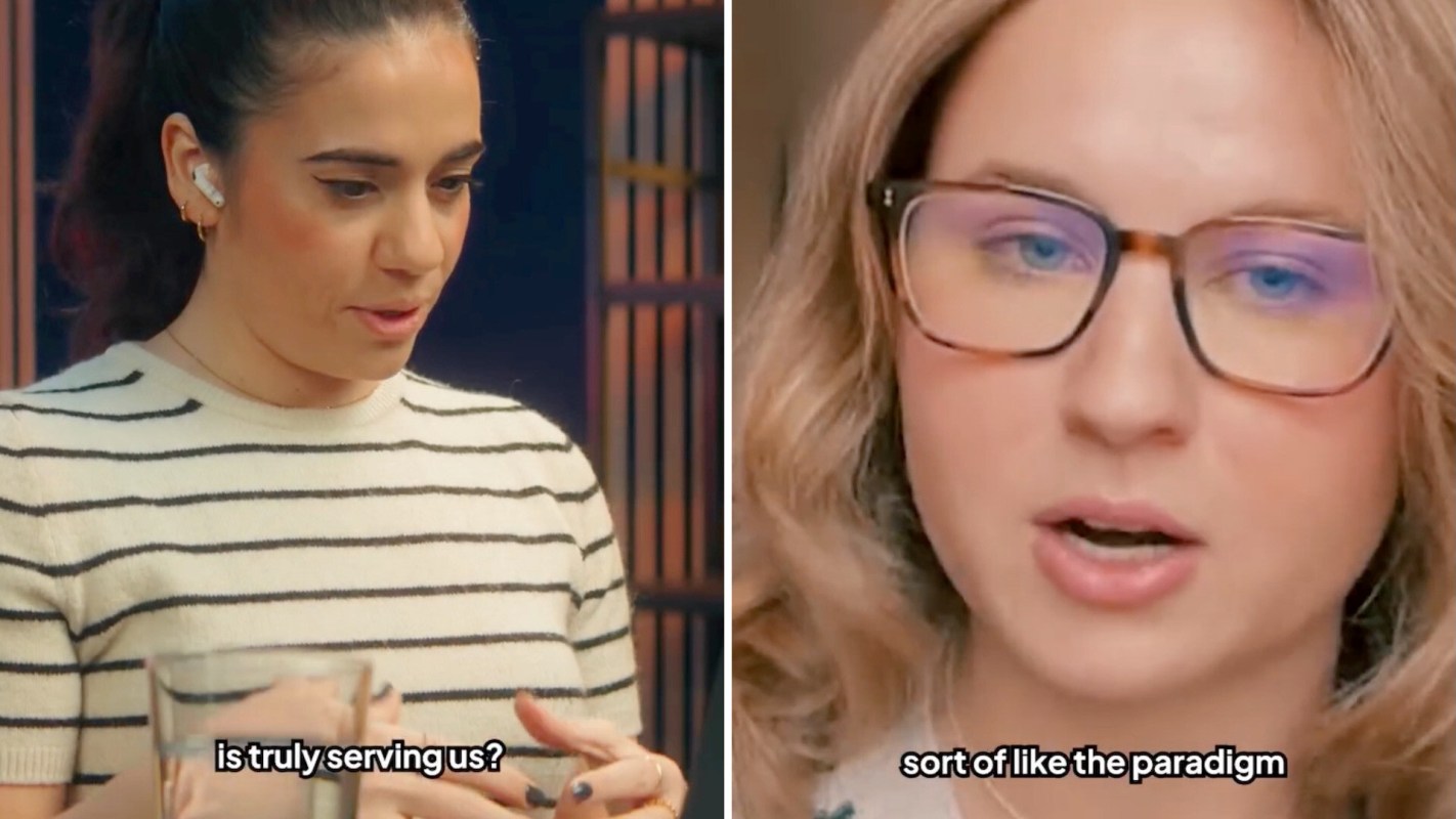 Two women are engaged in conversation; one appears thoughtful while the other speaks animatedly.