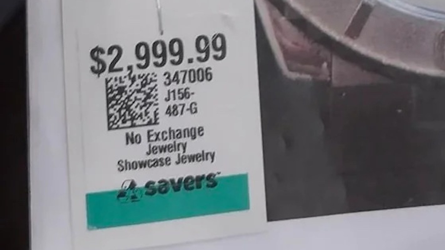 A price tag displaying $2,999.99 for jewelry, labeled as no exchange and marked by Savers.