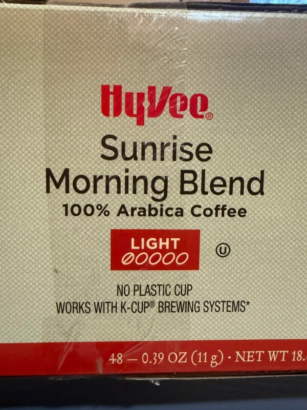 Sunrise Morning Blend coffee in a box with the red Hy-Vee logo and a label that says No Plastic Cup.