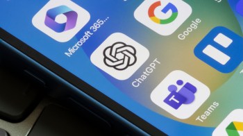 A close-up of a smartphone screen displaying various app icons, including ChatGPT and Microsoft Teams.