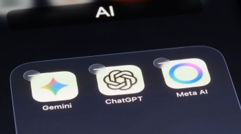 A close-up of a smartphone screen displaying AI application icons for Gemini, ChatGPT, and Meta AI.