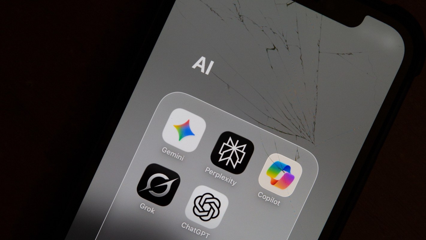 A smartphone screen displaying various AI application icons, including ChatGPT, with a noticeable crack on the surface.