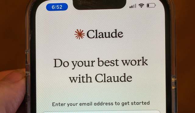 A smartphone screen displaying a welcome message for the Claude app with an email entry prompt.