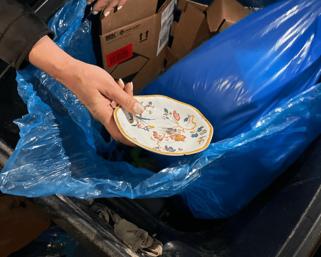 Sacks ran into fellow "trash walkers" who were drawn to a set of plates outside a thrift store.