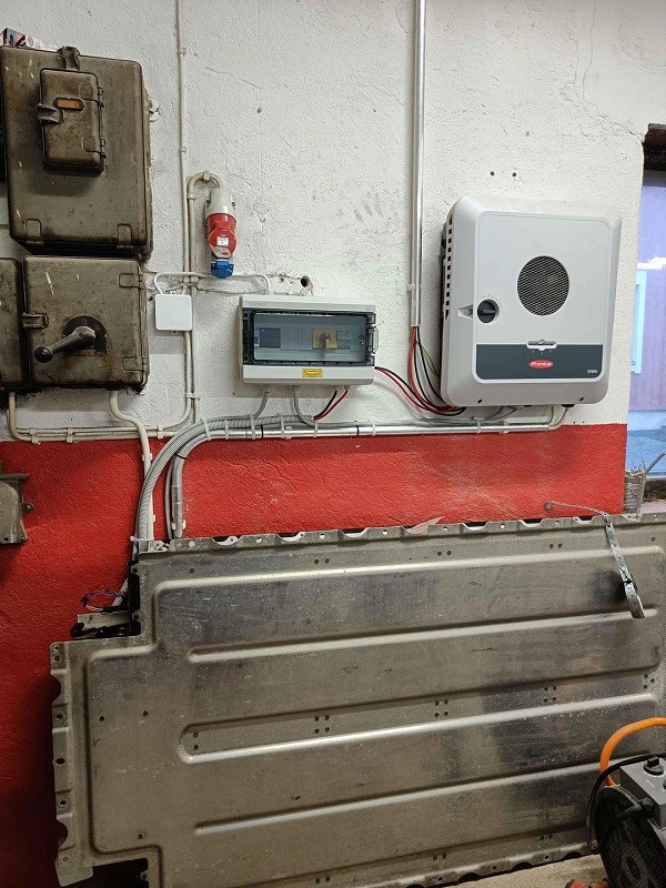 A full view of the repurposed EV battery setup.