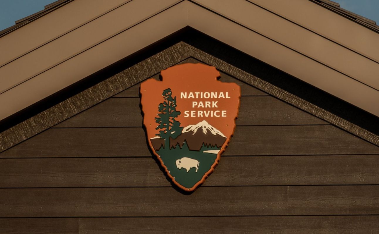 National Park Service sign on building.