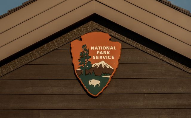 National Park Service sign on building.