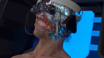 A person wearing a VR headset with a transparent face revealing internal anatomy and neural structures.