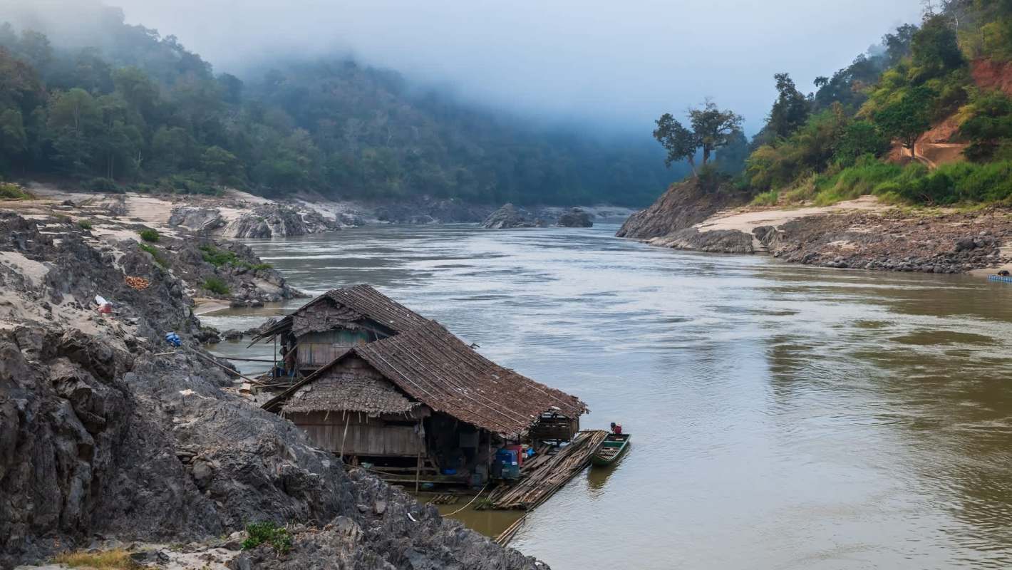 A hut on a river.