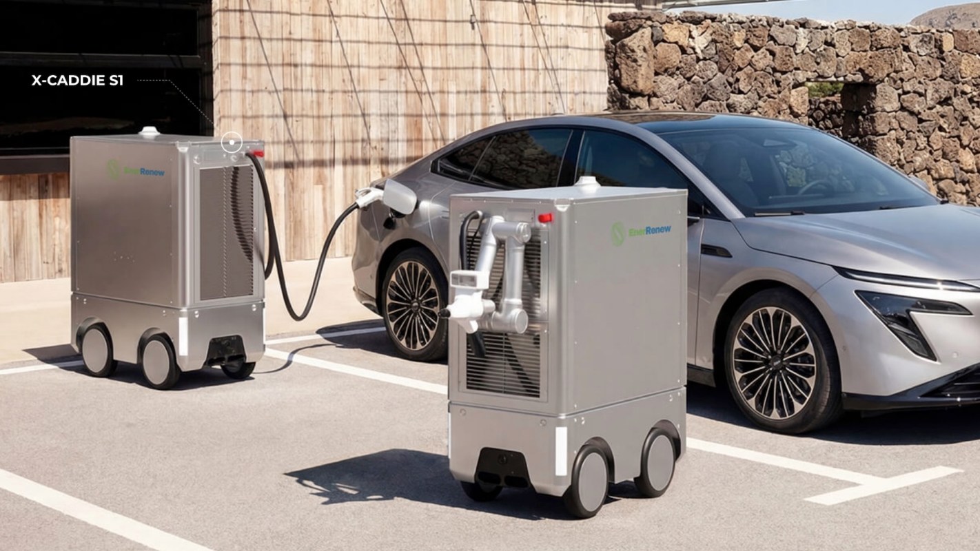 Two electric vehicle charging units are parked beside a silver electric car in a modern outdoor setting.