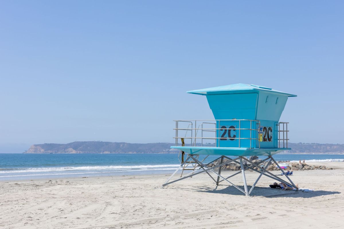 A lifeguard tower on a beach.