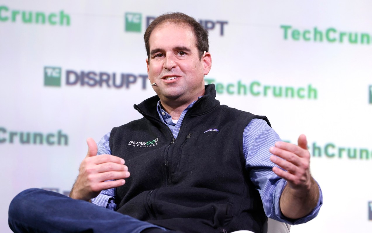 Redwood Materials CEO JB Straubel in a black vest.