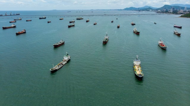 Aerial view of oil tankers anchored in the Strait of Hormuz.