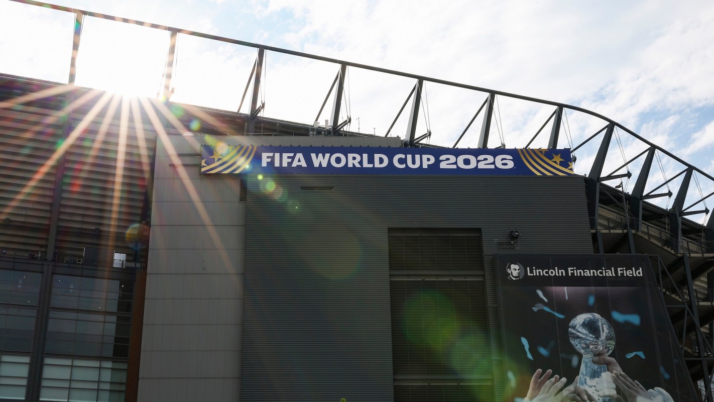 The exterior of Lincoln Financial Field, featuring a FIFA World Cup 2026 banner and sunlight streaming in.