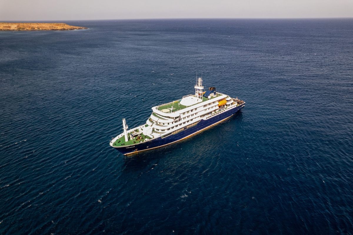 A large cruise ship in water.