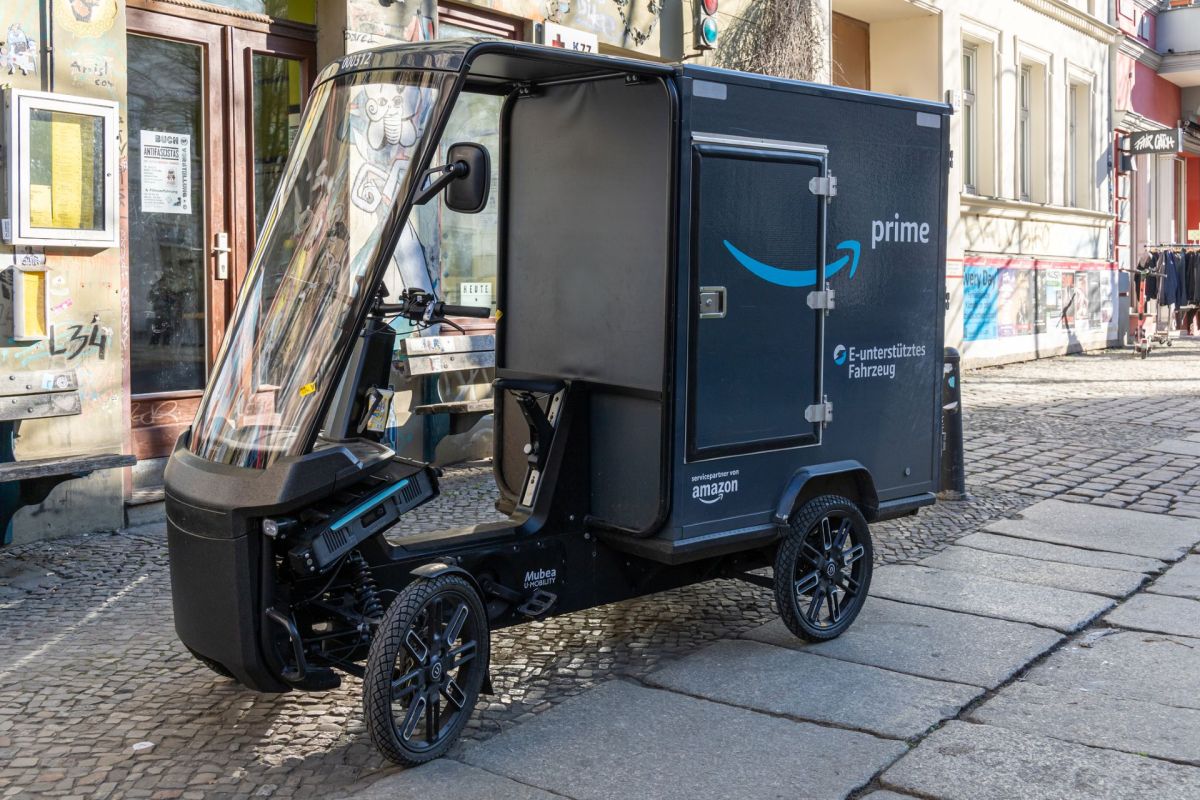 An electric Amazon Prime delivery vehicle.