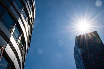 Sun and skyscrapers in Europe.