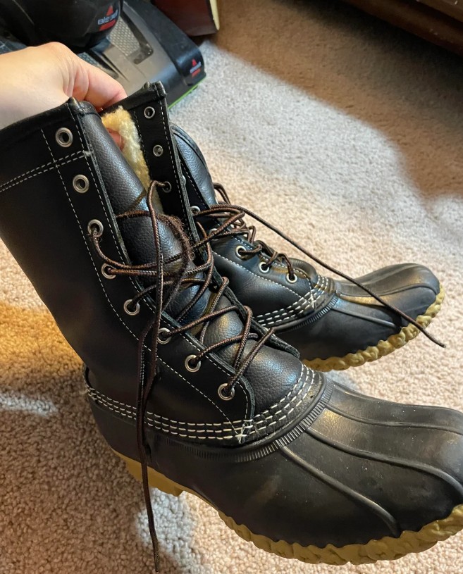 A pair of black L.L.Bean bean boots.