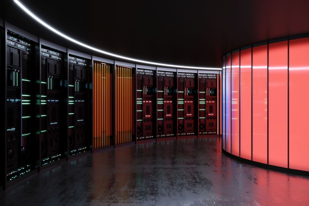 A data center corridor with illuminated server racks and curved red decorative panels.