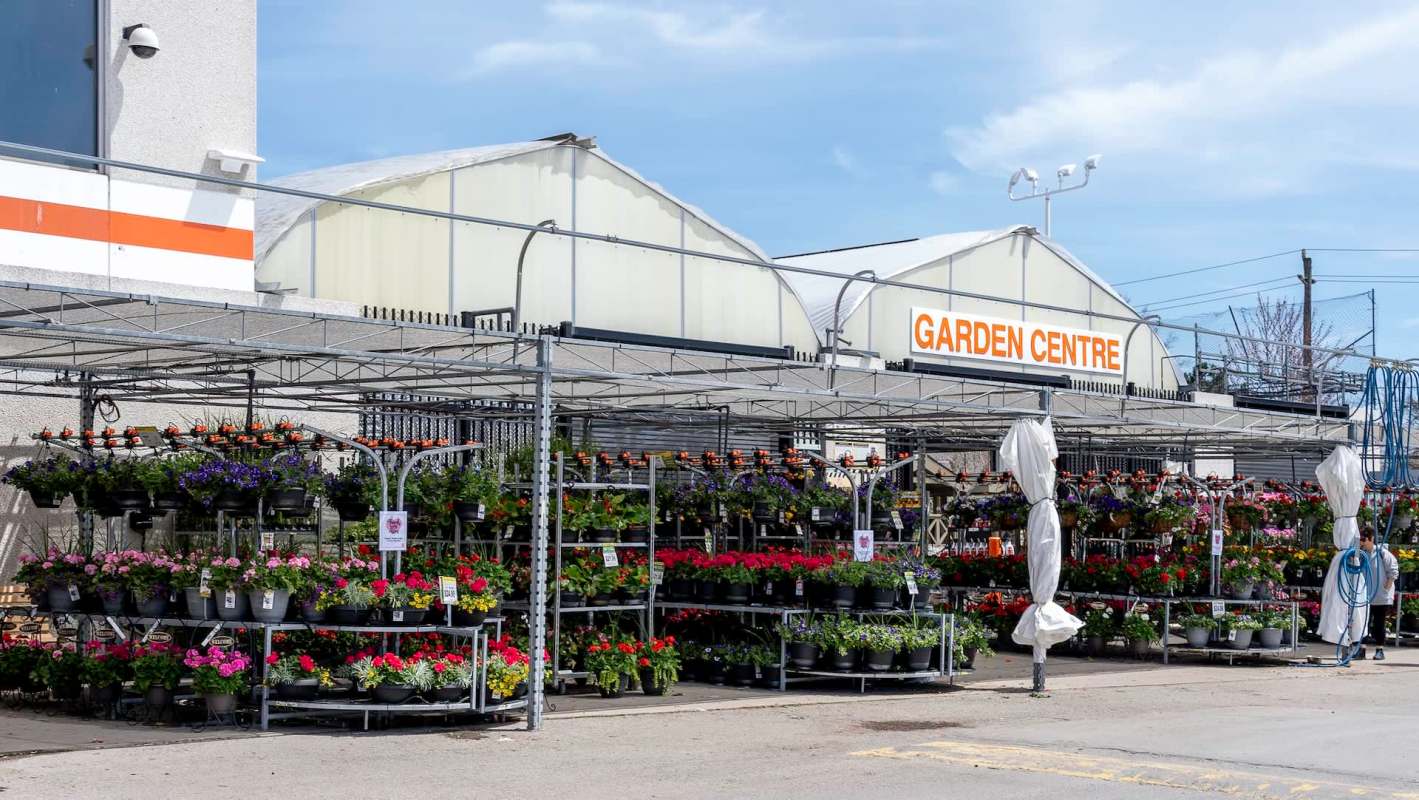 A garden center showcasing colorful flowers and potted plants.