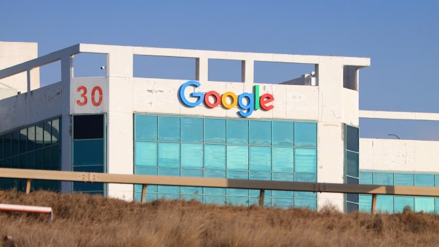 A building with the Google logo above reflective windows.
