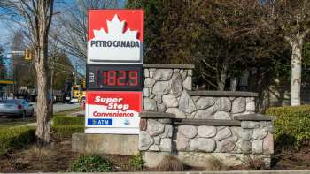 A Petro-Canada gas station sign displaying a price of 182.9 dollars per liter.