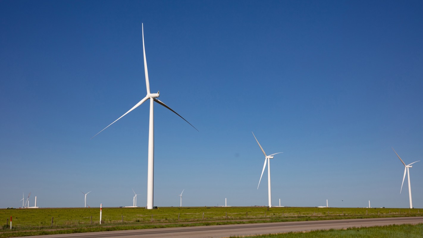 Wind turbines on a clear day.