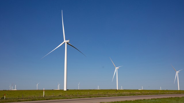 Wind turbines on a clear day.