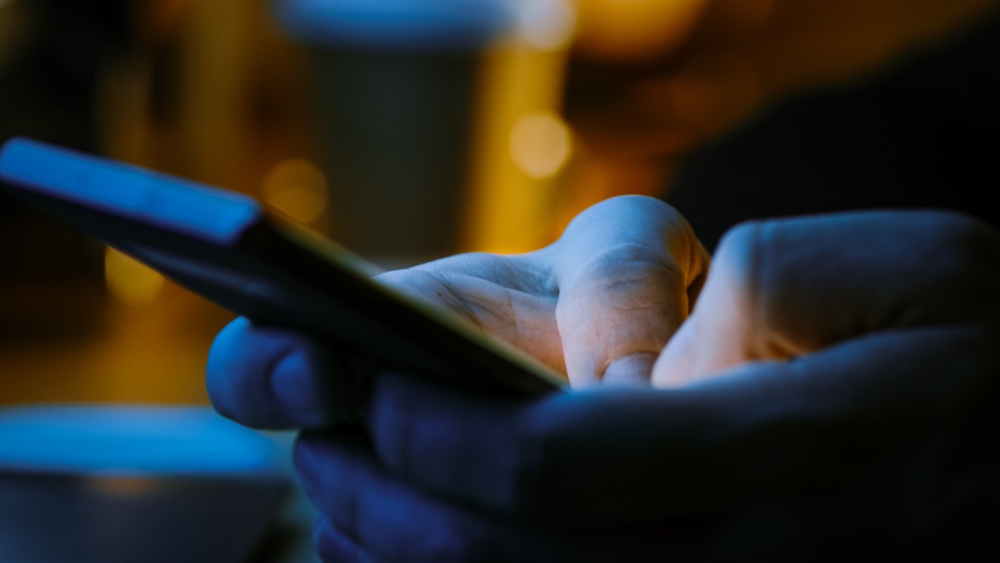 A person texting.